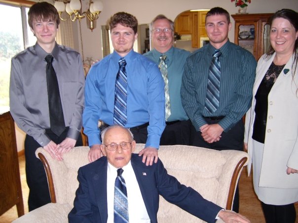 April 2008, after attending my grandmother’s funeral. I am standing above my grandfather.